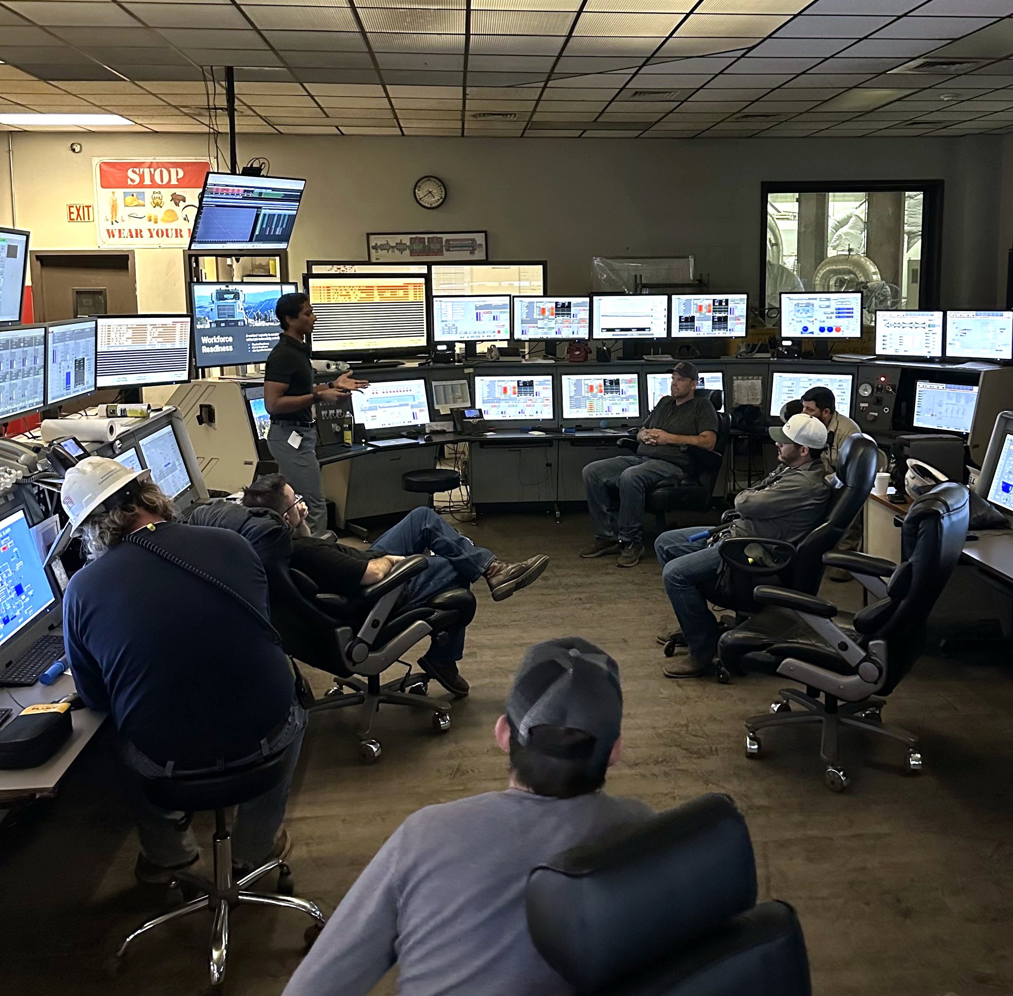 Industrial operators in a control room during a Longeva training session