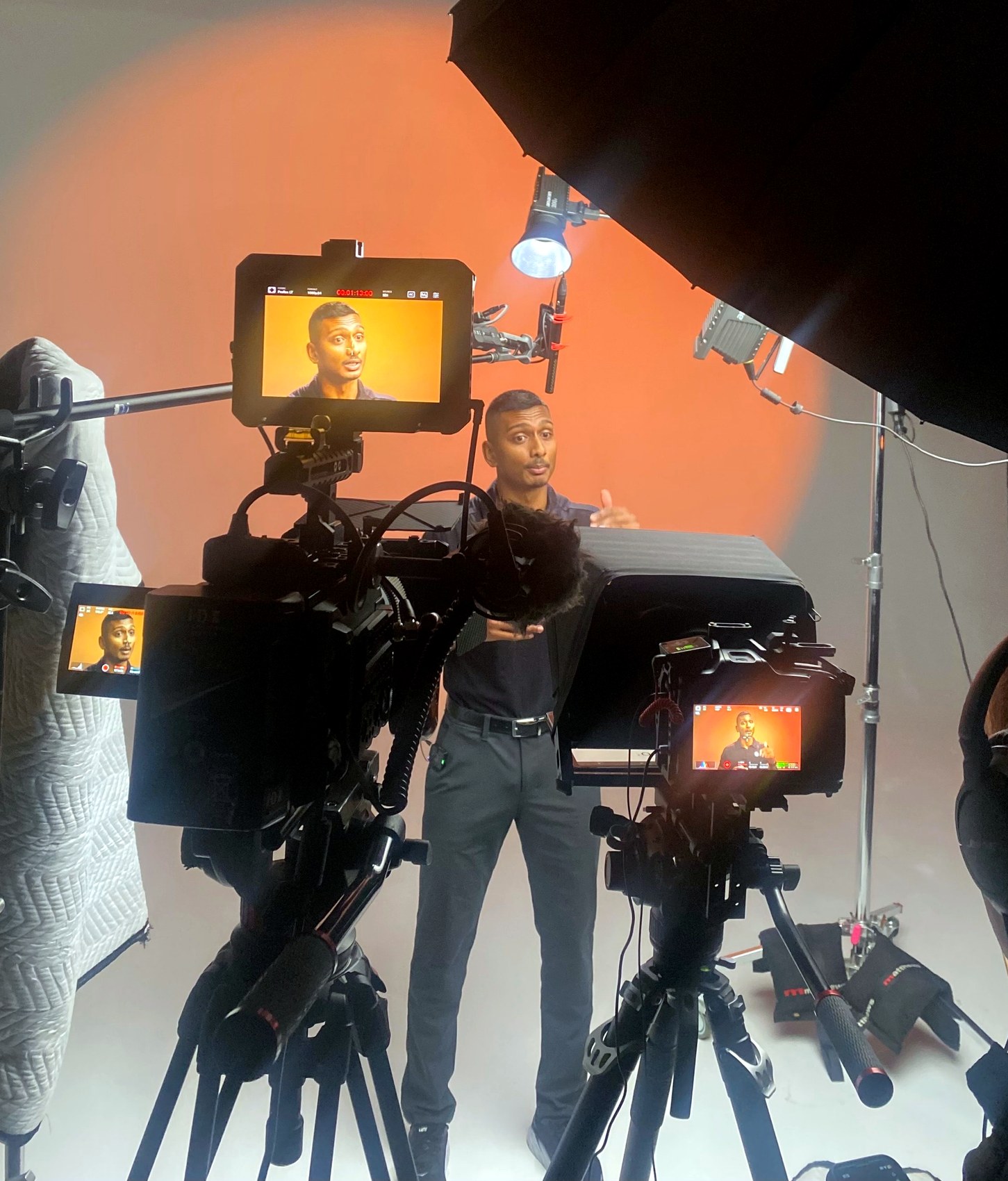 Nicholas Prasad recording movement education content on a professional studio set